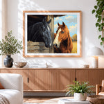 Finished black and brown horses in a stable cross stitch artwork displayed