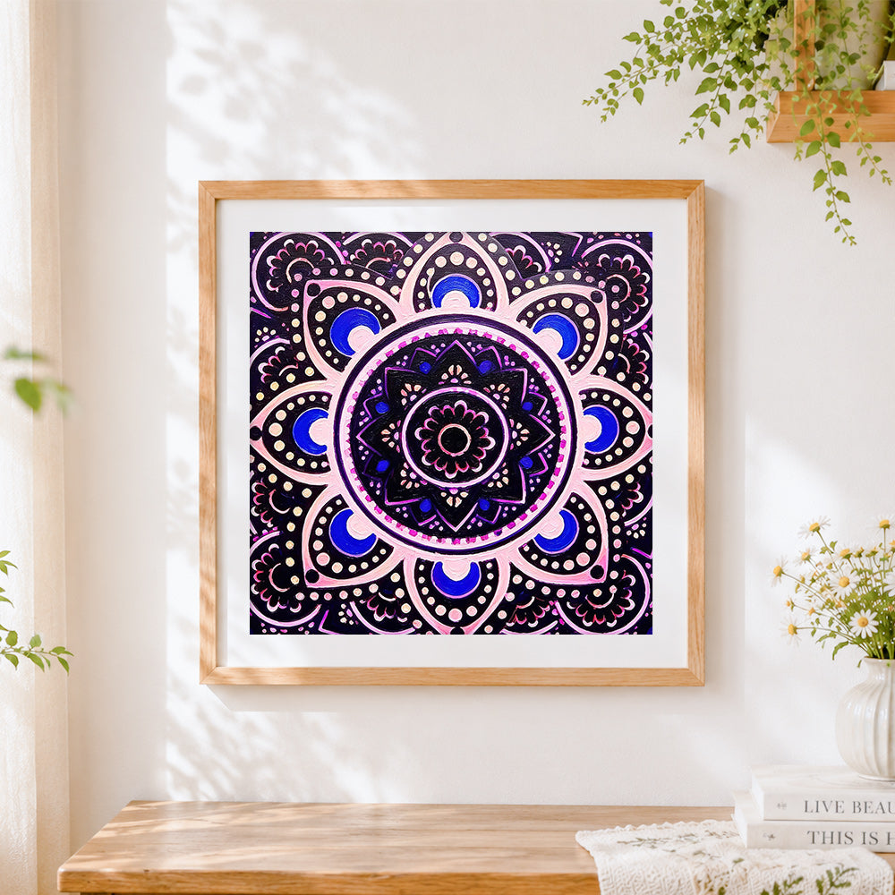 Finished black and purple mandala cross stitch artwork displayed