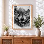 Finished black and white double exposure wolf cross stitch artwork displayed