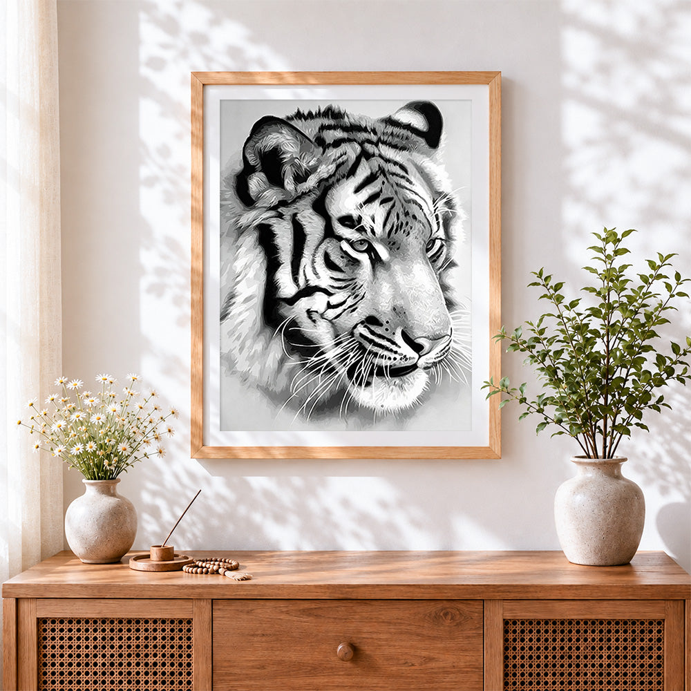 Finished black and white tiger sketch cross stitch artwork displayed