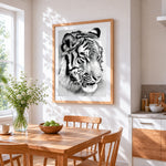 Black and white tiger sketch cross stitch artwork displayed on wall as home decor