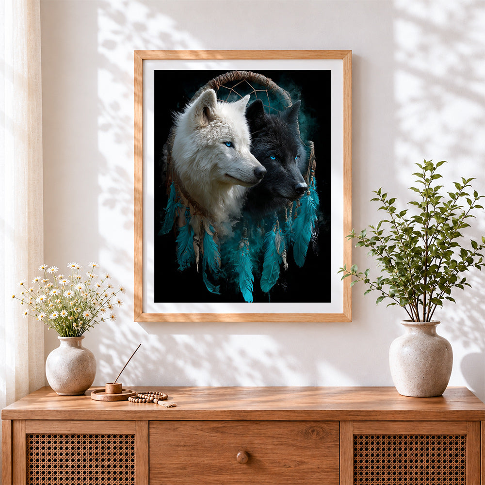 Finished black and white wolves in dreamcatcher cross stitch artwork displayed