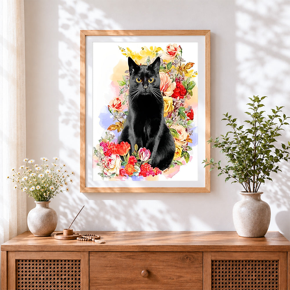 Finished black cat among flowers cross stitch artwork displayed