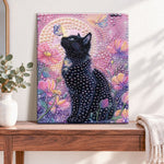 Finished black cat and butterflies pearl diamond painting artwork displayed as home decor