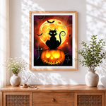 Finished black cat and spiderweb under a full moon cross stitch artwork displayed