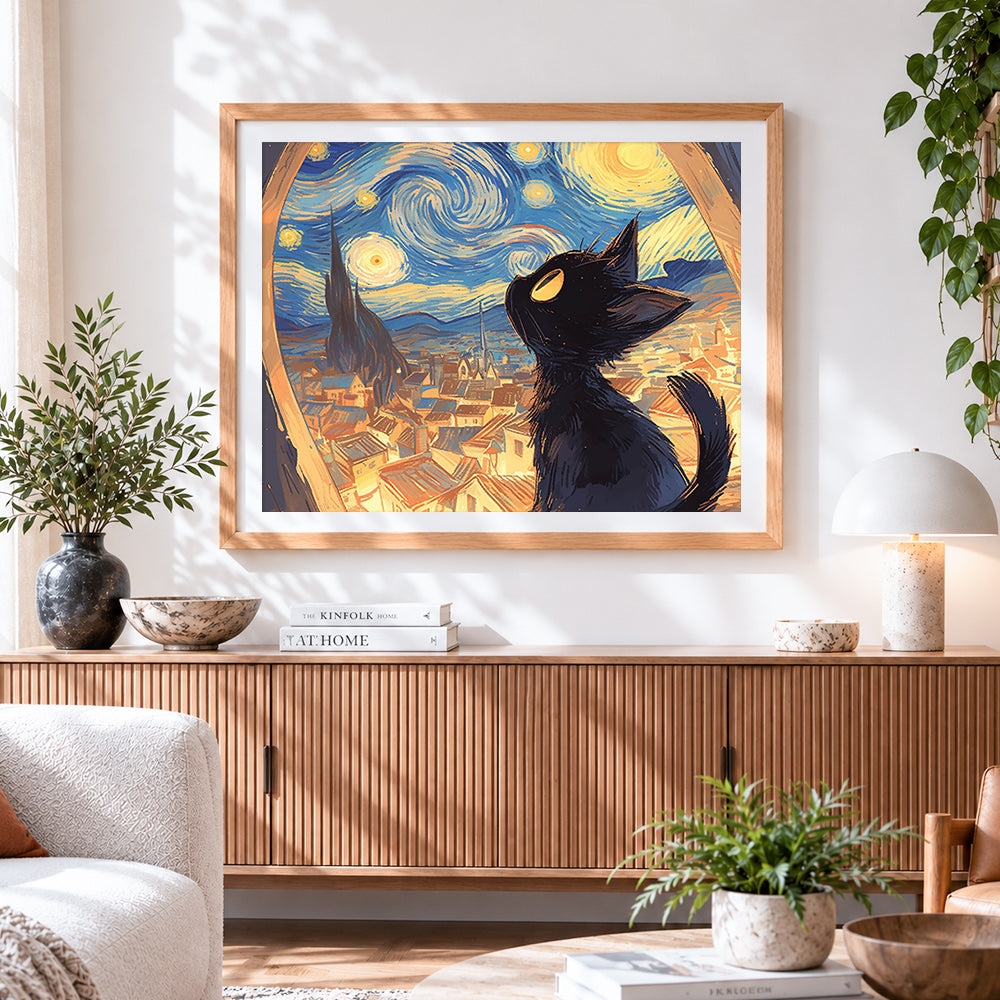 Finished black cat gazing at the starry night cross stitch artwork displayed