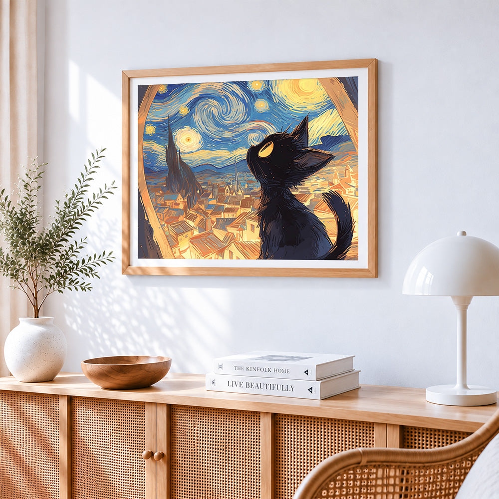 Black cat gazing at the starry night cross stitch artwork displayed on wall as home decor