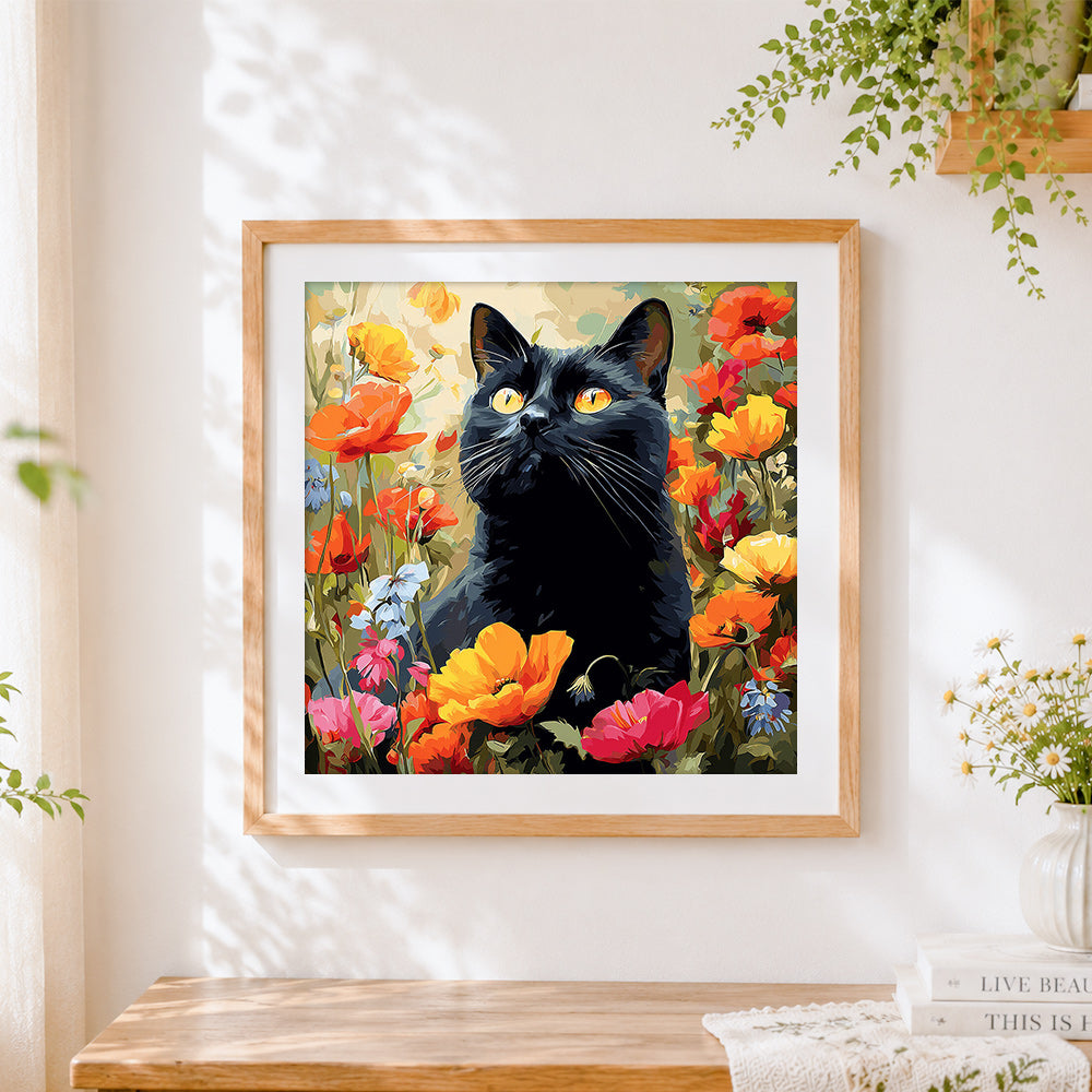 Finished black cat in a poppy field cross stitch artwork displayed