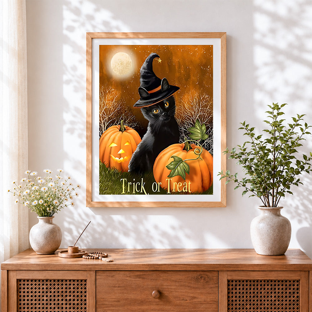 Finished black cat in witch hat with pumpkins cross stitch artwork displayed