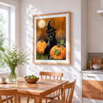 Black cat in witch hat with pumpkins cross stitch artwork displayed on wall as home decor