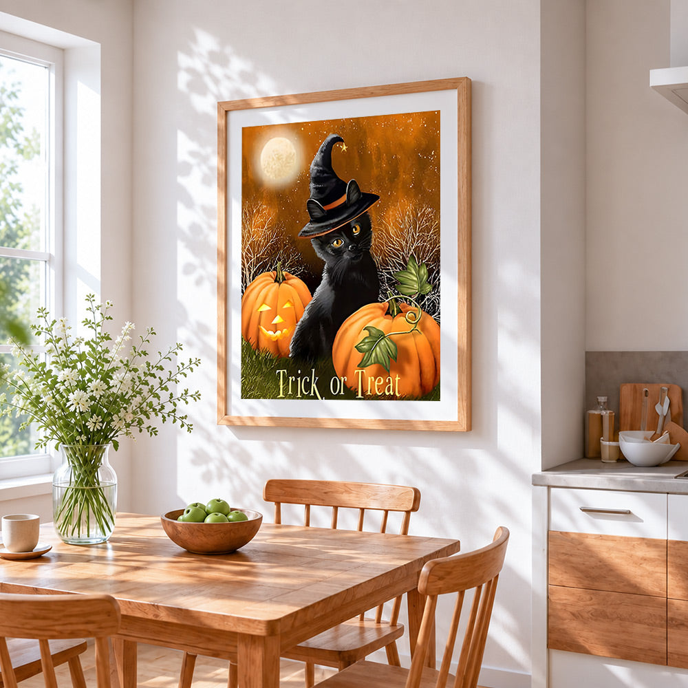 Black cat in witch hat with pumpkins cross stitch artwork displayed on wall as home decor