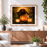 Finished black cat on glowing pumpkins cross stitch artwork displayed