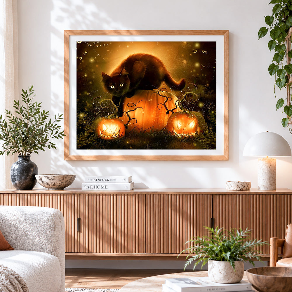 Finished black cat on glowing pumpkins cross stitch artwork displayed