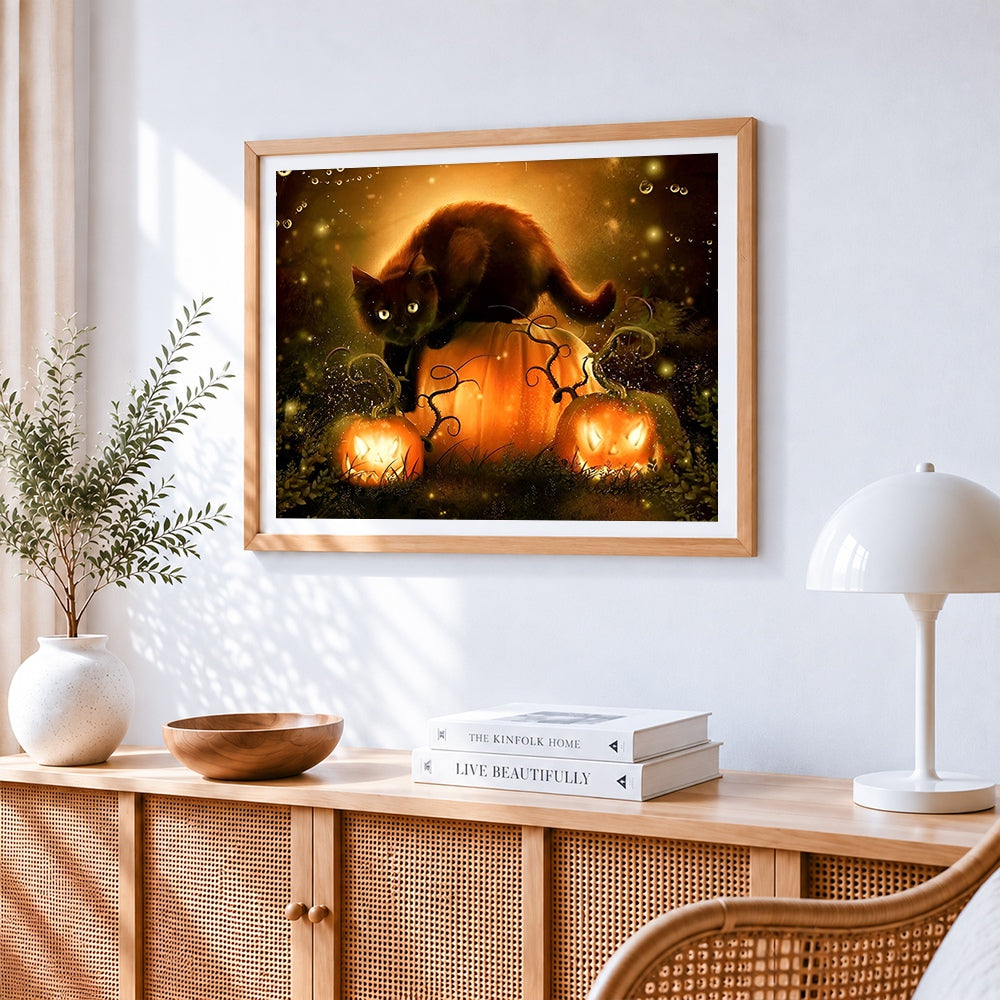 Black cat on glowing pumpkins cross stitch artwork displayed on wall as home decor
