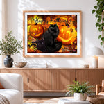 Finished black cats and jack-o'-lanterns in autumn leaves cross stitch artwork displayed