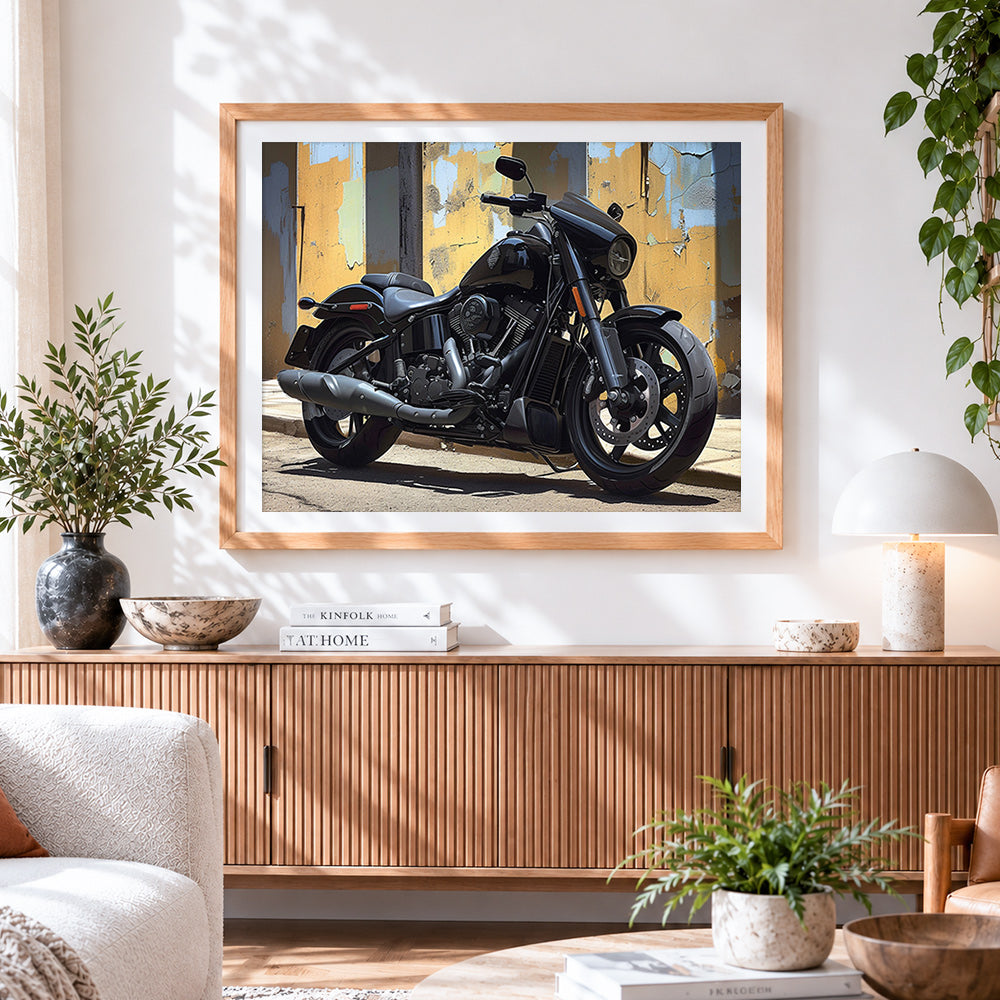 Finished black cruiser motorcycle cross stitch artwork displayed