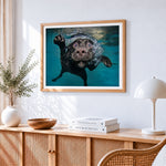 Black labrador swimming underwater cross stitch artwork displayed on wall as home decor