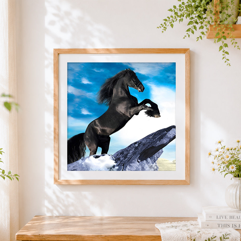 Finished black stallion horse cross stitch artwork displayed