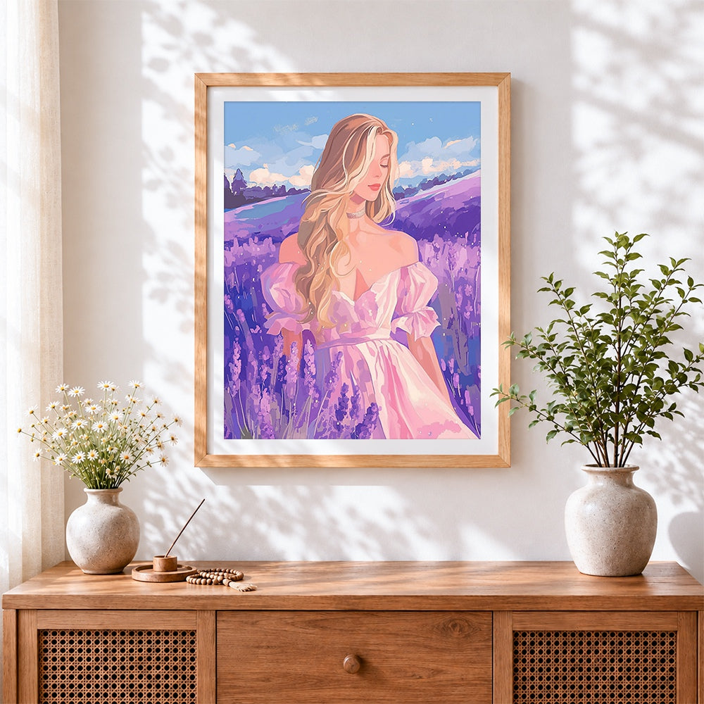 Finished blonde woman in lavender field cross stitch artwork displayed