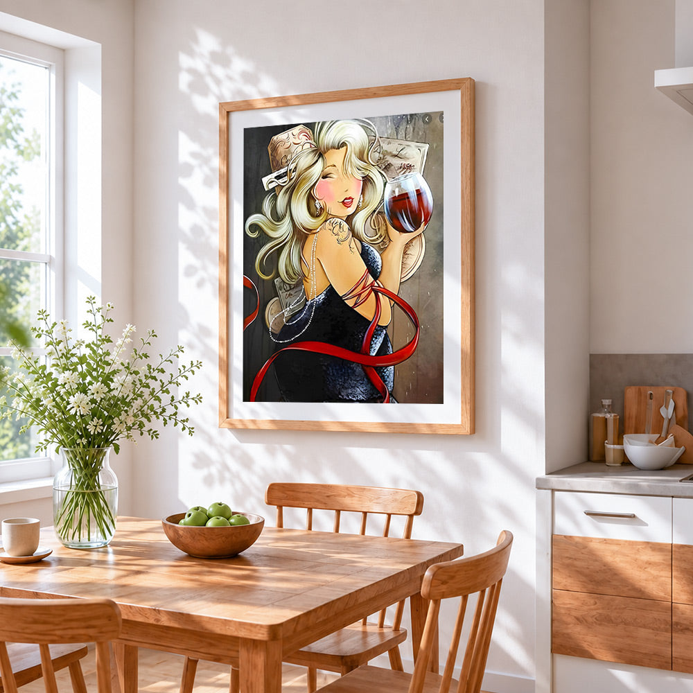 Blonde woman with glass of wine cross stitch artwork displayed on wall as home decor