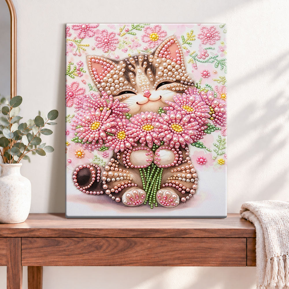 Finished blossom holding kitten pearl diamond painting artwork displayed as home decor