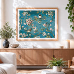 Finished blossoming cherry tree with birds cross stitch artwork displayed