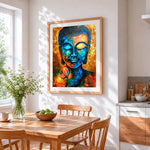 Blue and gold buddha cross stitch artwork displayed on wall as home decor