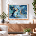 Finished blue and gold fluid paint by numbers artwork displayed as home decor