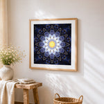 Blue and gold lotus mandala cross stitch artwork displayed on wall as home decor