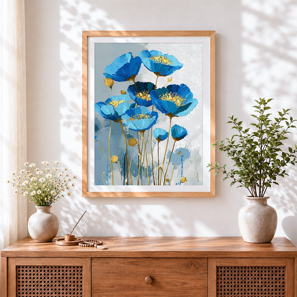 Finished blue and gold poppies cross stitch artwork displayed
