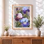 Finished blue and purple irises cross stitch artwork displayed