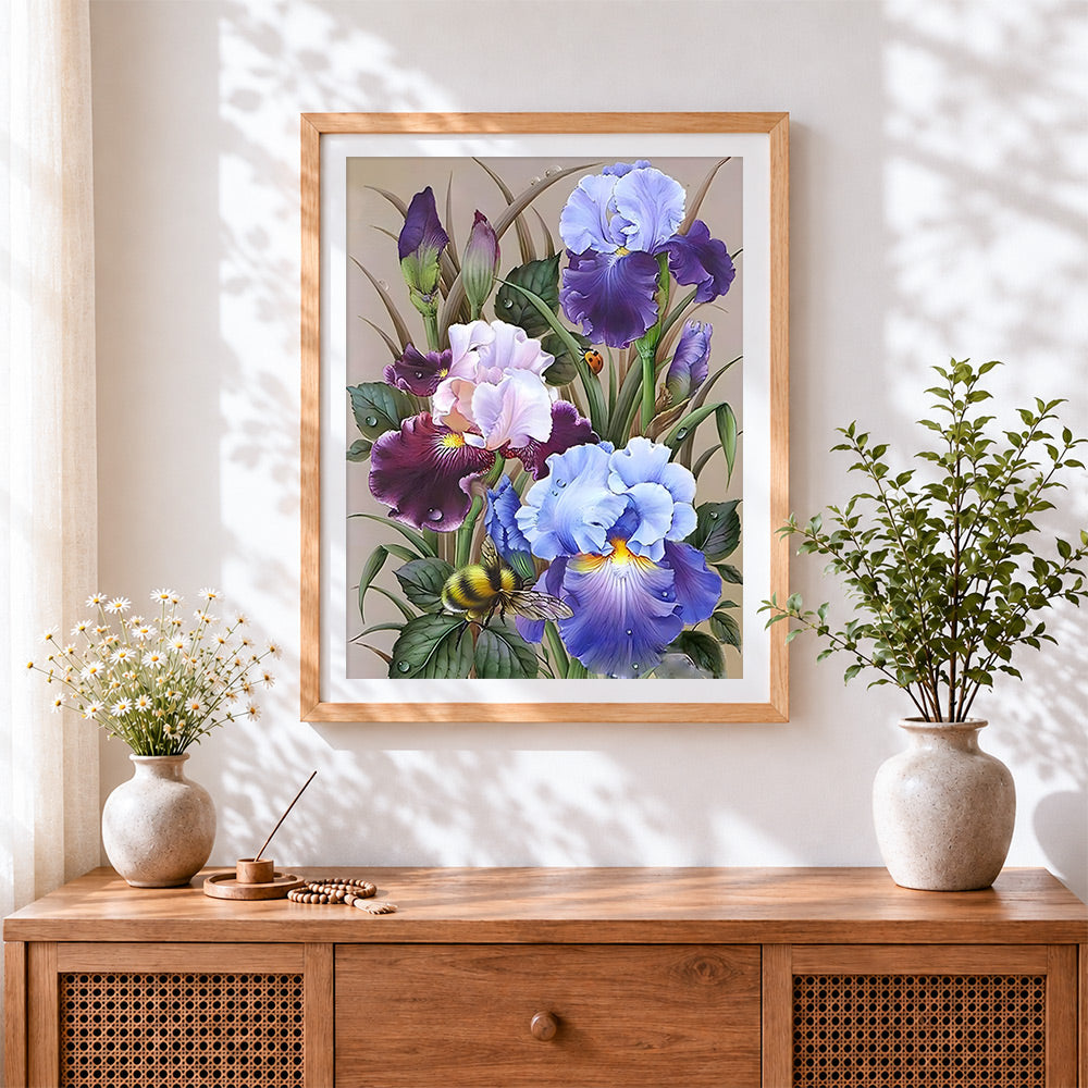 Finished blue and purple irises cross stitch artwork displayed