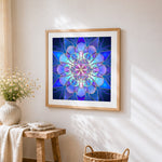 Blue and purple lotus mandala cross stitch artwork displayed on wall as home decor