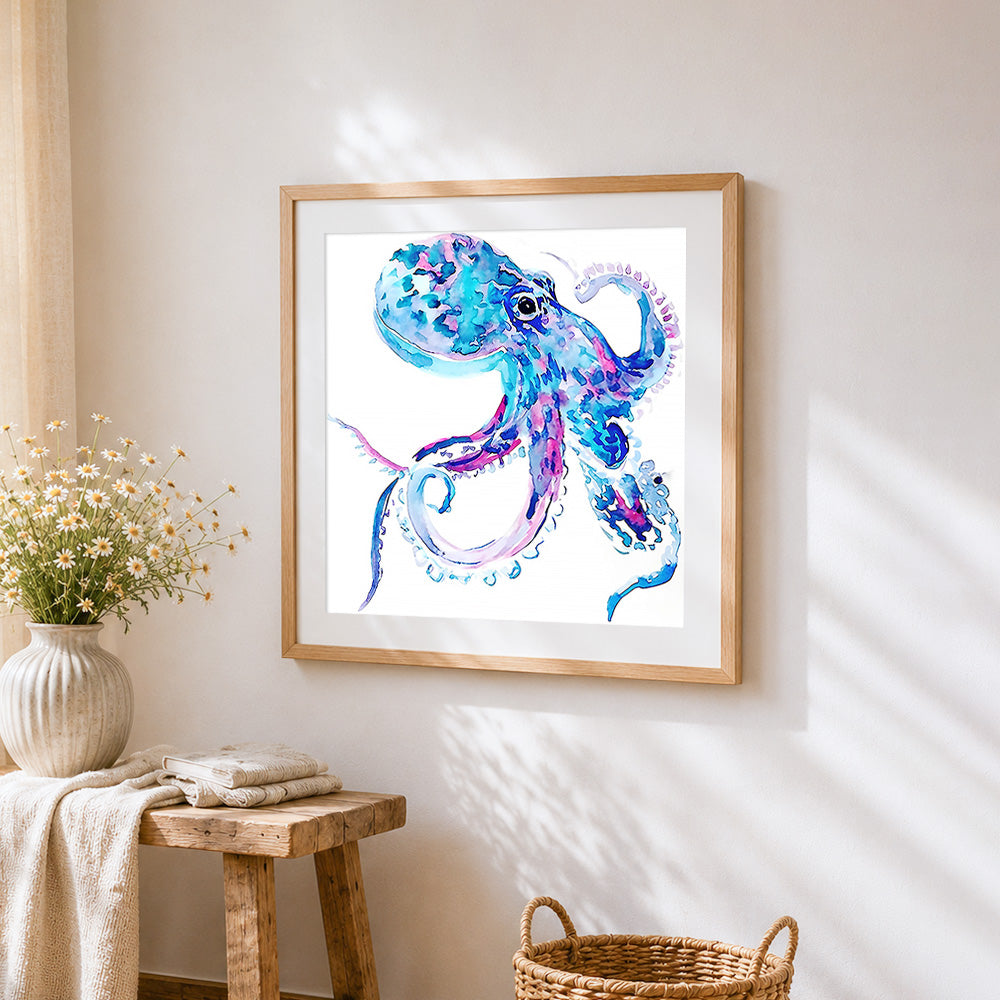 Blue and purple watercolour octopus cross stitch artwork displayed on wall as home decor