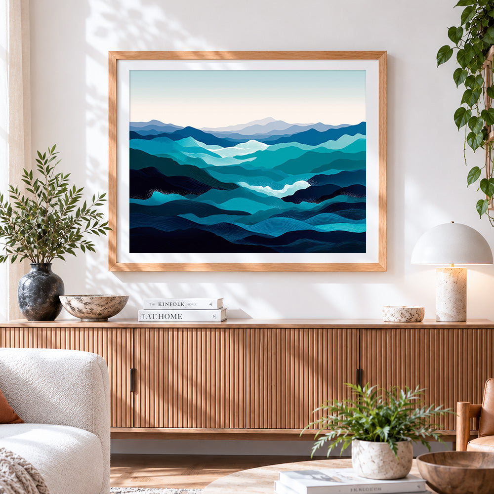 Finished blue and teal abstract waves and mountains cross stitch artwork displayed