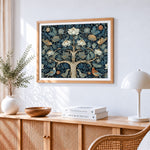 Blue and white floral tree with birds cross stitch artwork displayed on wall as home decor