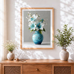 Finished blue and white lilies in a vase cross stitch artwork displayed