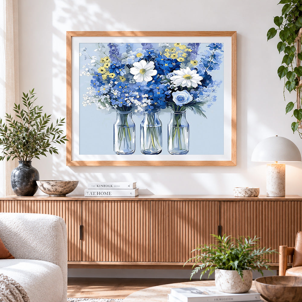 Finished blue and white wildflowers in glass bottles paint by numbers artwork displayed as home decor