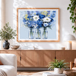 Finished blue and white wildflowers in glass bottles paint by numbers artwork displayed as home decor