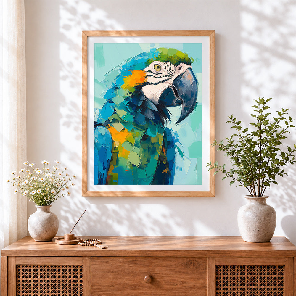 Finished blue and yellow macaw portrait cross stitch artwork displayed