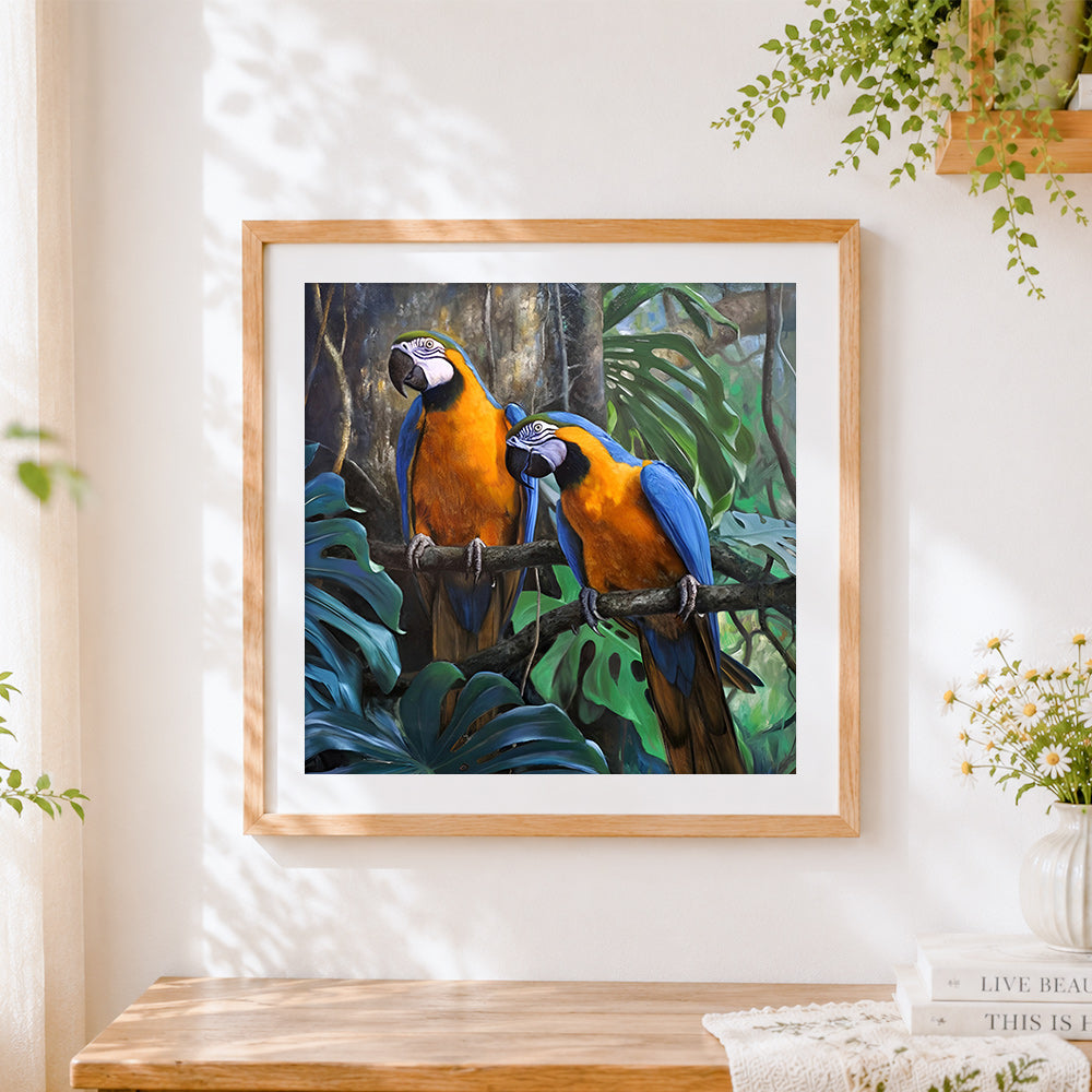 Finished blue and yellow macaws cross stitch artwork displayed