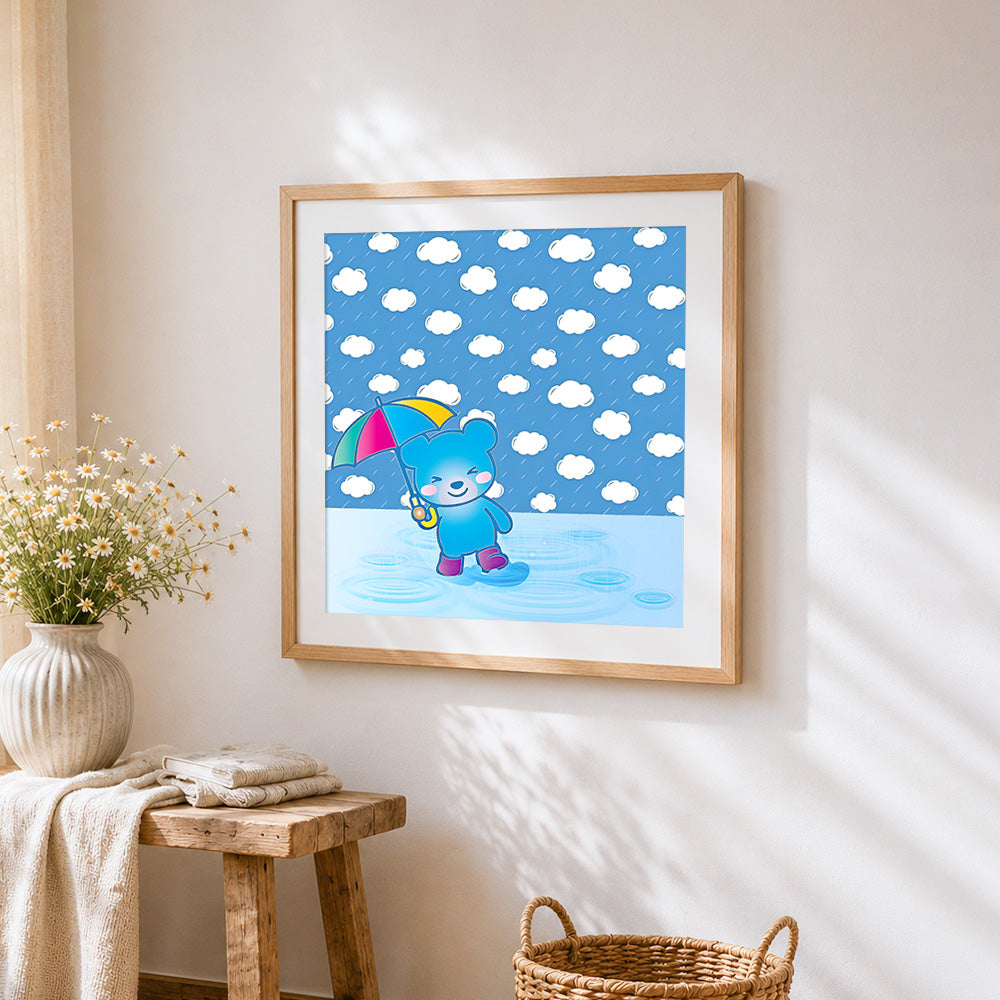 Blue bear with umbrella in rain cross stitch artwork displayed on wall as home decor