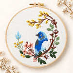 Blue bird on floral branch embroidery kit