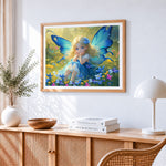 Blue butterfly fairy cross stitch artwork displayed on wall as home decor