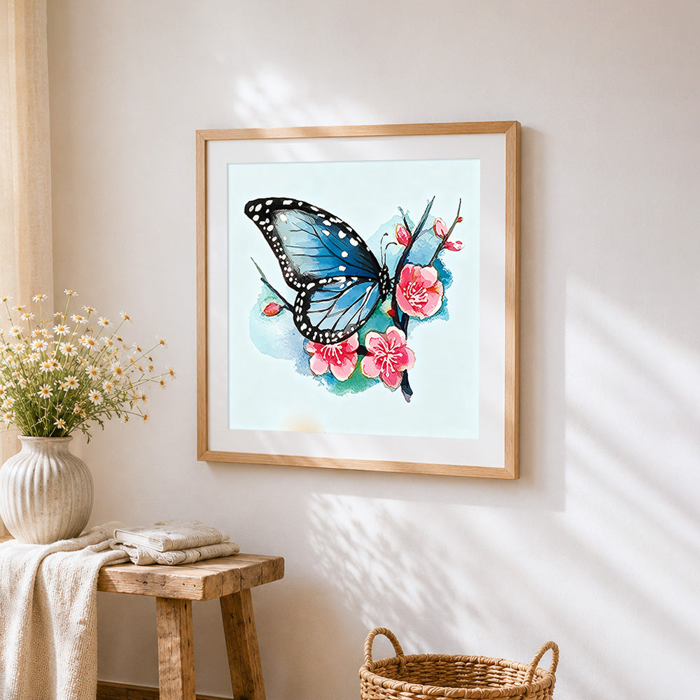 Blue butterfly with cherry blossoms cross stitch artwork displayed on wall as home decor
