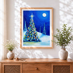 Finished blue christmas tree in the snow cross stitch artwork displayed