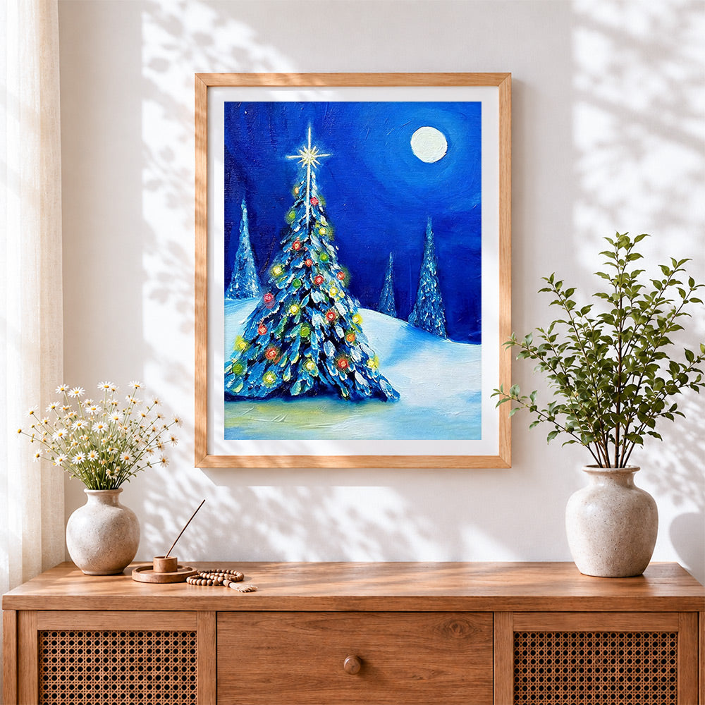 Finished blue christmas tree in the snow cross stitch artwork displayed
