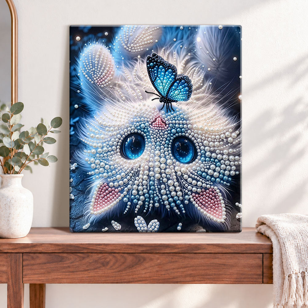 Finished blue eyed feline and butterfly pearl diamond painting artwork displayed as home decor