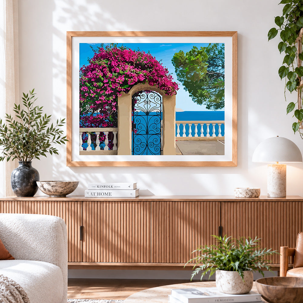 Finished blue gate with bougainvillea cross stitch artwork displayed