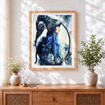 Finished blue haired witch and black cat cross stitch artwork displayed